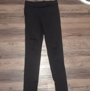 Black Jeggings With Rips In Front